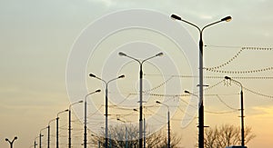 Many streetlights along the road