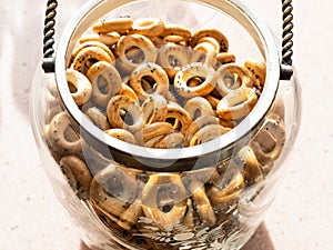 Many Sushki with poppy seeds in vintage glass jar