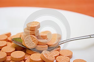 Many tablets and orange vitamin - protection during quarantine, coronavirus, covid19