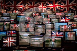 many televisions with the flag of the United Kingdom of Great Britain