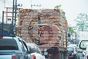 Many Timber on truck. wood logs transportation.