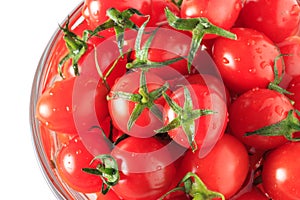 Many tomato in the glass bowl