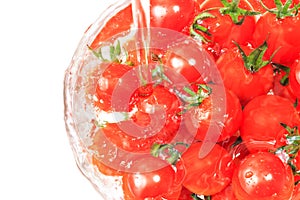 Many tomato in the glass bowl