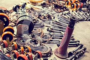 Many tools and old auto spare parts car at a car repair shop. Car parts in old warehouses