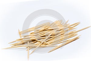 Many toothpicks on a white background photo