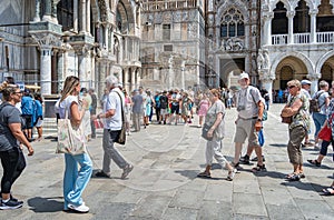 Many tourists visiting Piazzetta San Marco (St Marks Square) and Colonna di San Marco in Venice