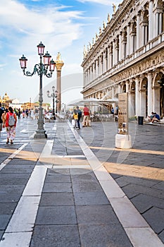 Many tourists visiting Piazzetta San Marco (St Marks Square) and Colonna di San Marco in Venice