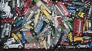 Many toy cars. Photos of toy cars in the suitcase