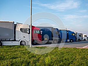 Many trucks on motorway service area