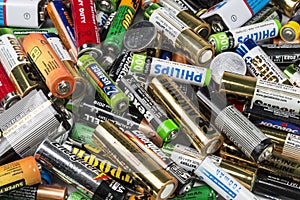 Many used AA and AAA sized batteries