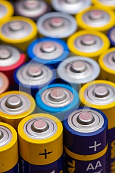 Many used AA electric batteries