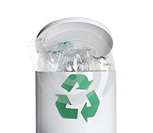 Many used bottles in trash bin isolated. Plastic recycling