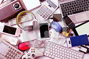 Many used modern Electronic gadgets for daily use on White floor, Reuse and Recycle concept