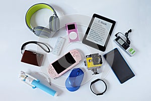 Many used modern Electronic gadgets for daily use on White floor, Reuse and Recycle concept photo