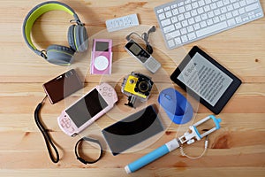 Many used modern Electronic gadgets for daily use on wooden floor, Reuse and Recycle concept
