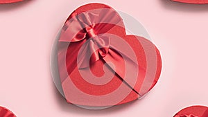 Many Valentines day heart red gifts enlarging on screen.