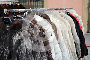 Many valuable fur coat in vintage style for sale