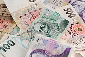Many czech koruna currency bills photo