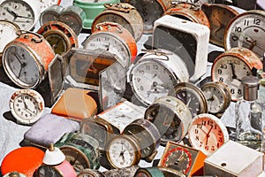 Many vintage clocks at a flea market