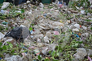 Many of waste garbage plastic, bottle, paper for background, pollution from garbage dump many, yard of plastic waste trash dirty r