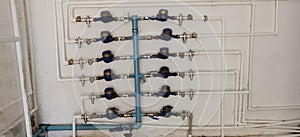 many water meters as a water distribution station in a large residential building