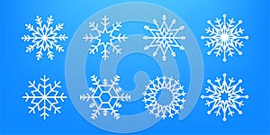 Many white cold flake elements on transparent background. Heavy snowfall, snowflakes in different shapes and forms