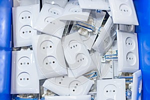 Many white electric sockets, outlets in box