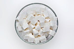 Many white pieces of sugar