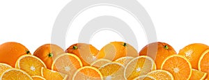 Many whole oranges in water drops and round slices isolated on white background. Fruit background for packaging