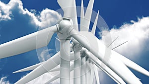 Many wind power generators on sky background.