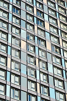 Many windows of multistorey building photo