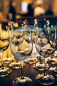 Many wine glasses bar brilliance light