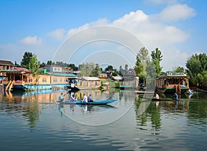 Many wooden boats on the Dal Lake by boat in Srinagar, India