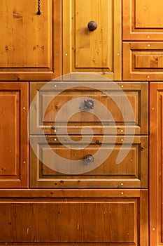 Many wooden drawers close-up. High quality photo