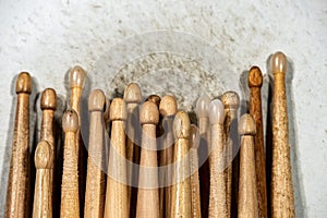 Many wooden drumsticks on an old snare drum - Percussion instrument