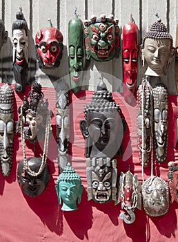Many wooden masks on market in Kathmandu in Nepal