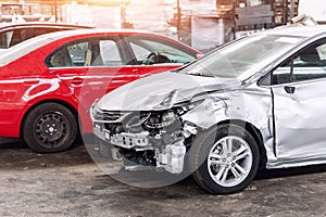 Many wrecked car after traffic accident crash at restore service maintenance station garage indoor. Insurance salvage photo