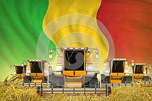 Many yellow farming combine harvesters on rye field with Mali flag background - front view, stop starving concept - industrial 3D