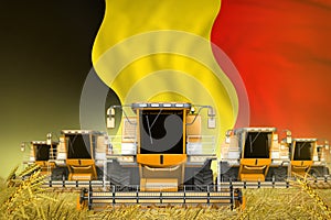 Many yellow farming combine harvesters on wheat field with Belgium flag background - front view, stop starving concept -