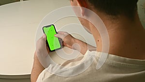 Manâ€™s Hand holding mobile phone. Lifestyle concept.