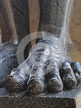 ManÃ¢â‚¬â„¢s feet and toes are made of marble