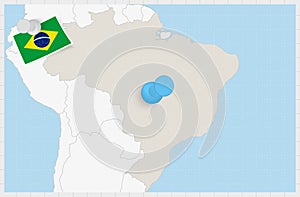 Map of Brazil with a pinned blue pin. Pinned flag of Brazil