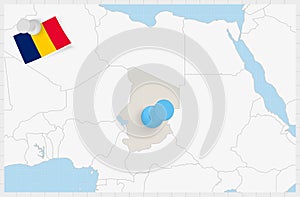 Map of Chad with a pinned blue pin. Pinned flag of Chad