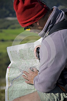 Map and compass orienteering outdoors photo
