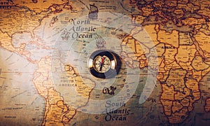 Map with compass. Simple navigation tools to orient in the world. The map used for background is in Public domain. Map source: