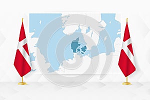Map of Denmark and flags of Denmark on flag stand