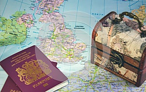 Map of Europe showing the UK, England, Ireland, France, British passports and a chest representing Brexit