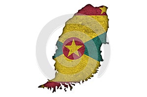 Map and flag of Grenada on weathered concrete