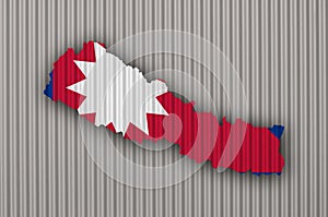Map and flag of Nepal on corrugated iron