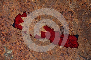 Map and flag of Nepal on rusty metal